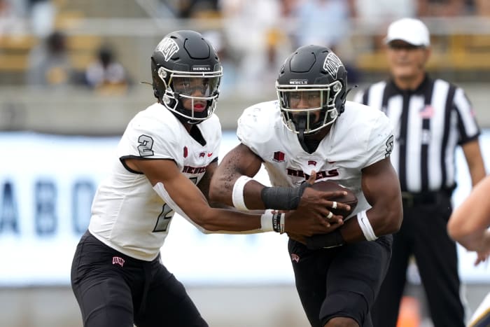Sep 10, 2022; Berkeley, California, USA; UNLV Rebels quarterback Doug Brumfield (2) hands off to running back Aidan Robbins (9) during the third quarter against the California Golden Bears at FTX Field at California Memorial Stadium. Mandatory Credit: Darren Yamashita-USA TODAY Sports